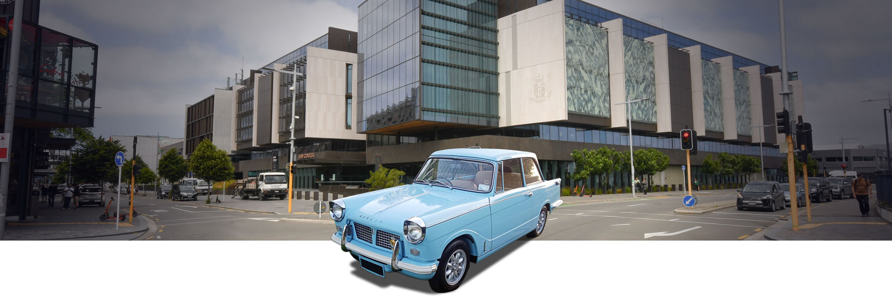 Triumph car in front of Law Courts