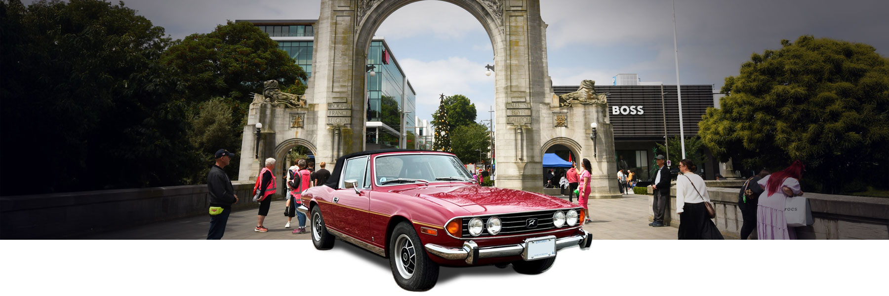 car in front of bridge of rememberance